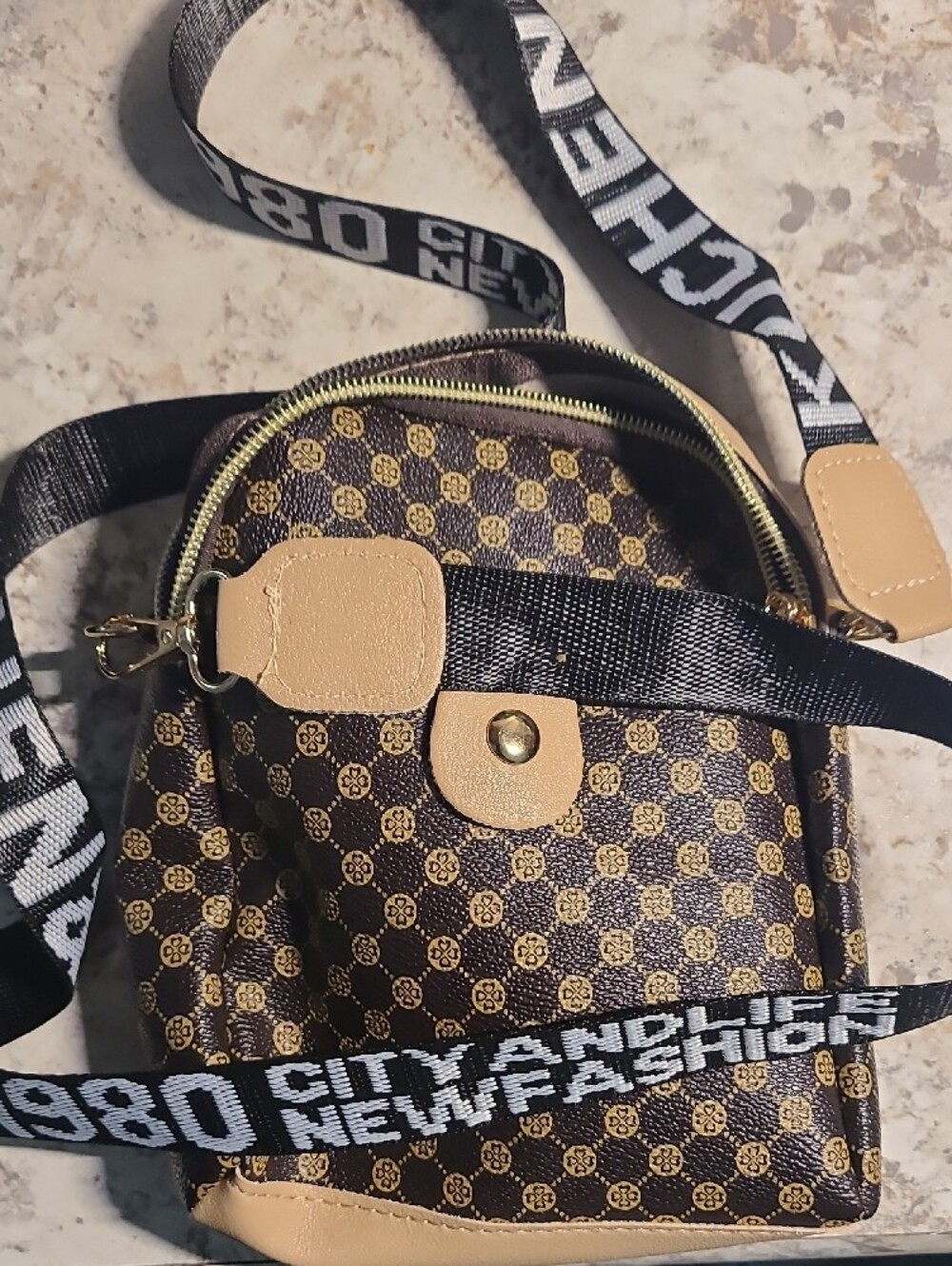 Womens Navy Patterned Crossbody Bag with Tan Trim